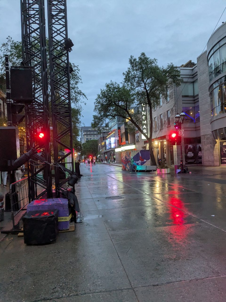 photo: street scene in the rain at dusk