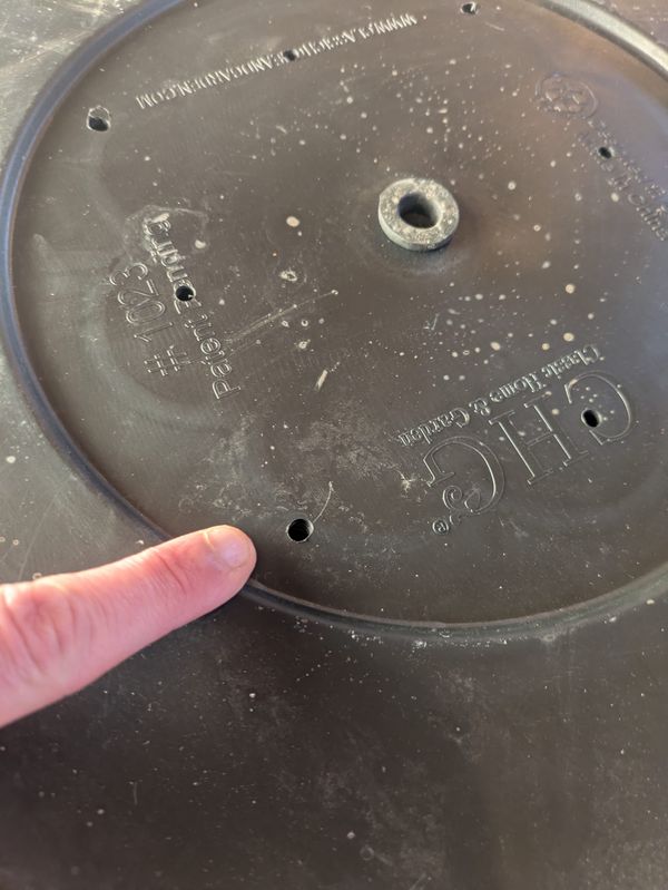 St. Paul Gardening DIY: Drilling Plastic Whiskey Barrels for Better Drainage