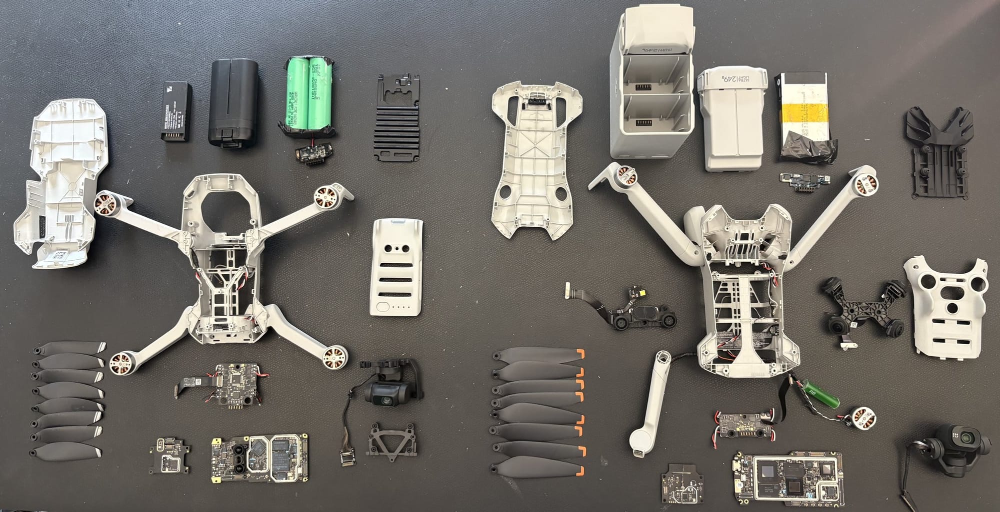 Drone components on Arena Physica's teardown laboratory bench