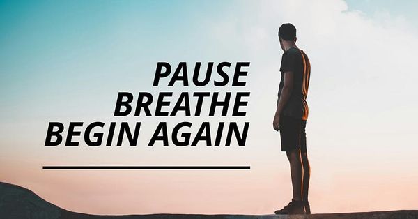 Man standing alone looking to the horizon.