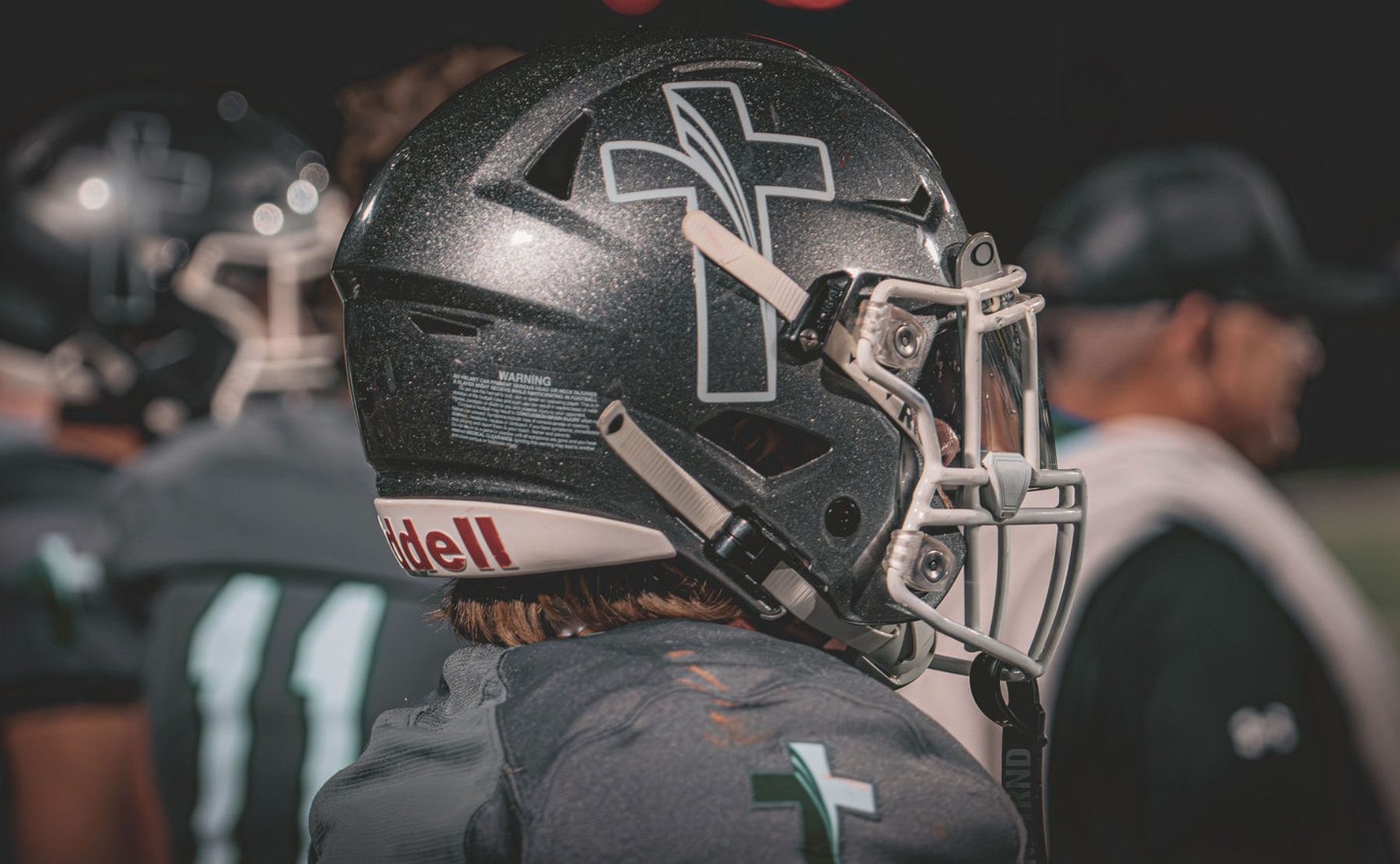 A close-up shot of the helmet, featuring the SFC logo, on a football player. Photo courtesy of Sioux Falls Christian.