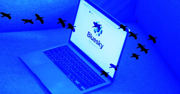 Photo montage of a laptop with the Bluesky logo displayed on screen overlapped with silhouettes of migrating birds, all in shades of blue.