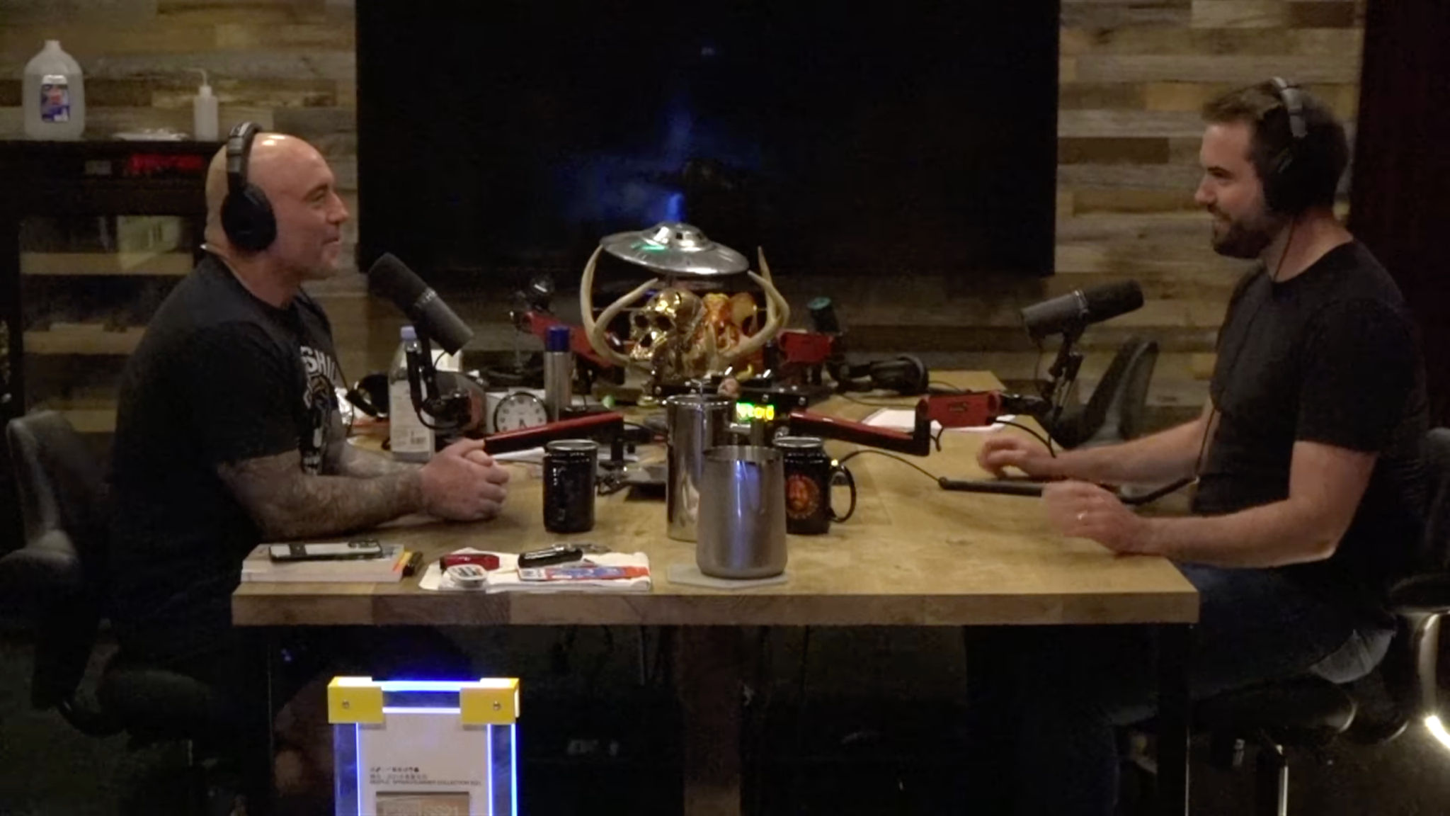 A screen capture of Joe Rogan and Chris Best speaking to one another on The Joe Rogan Experience