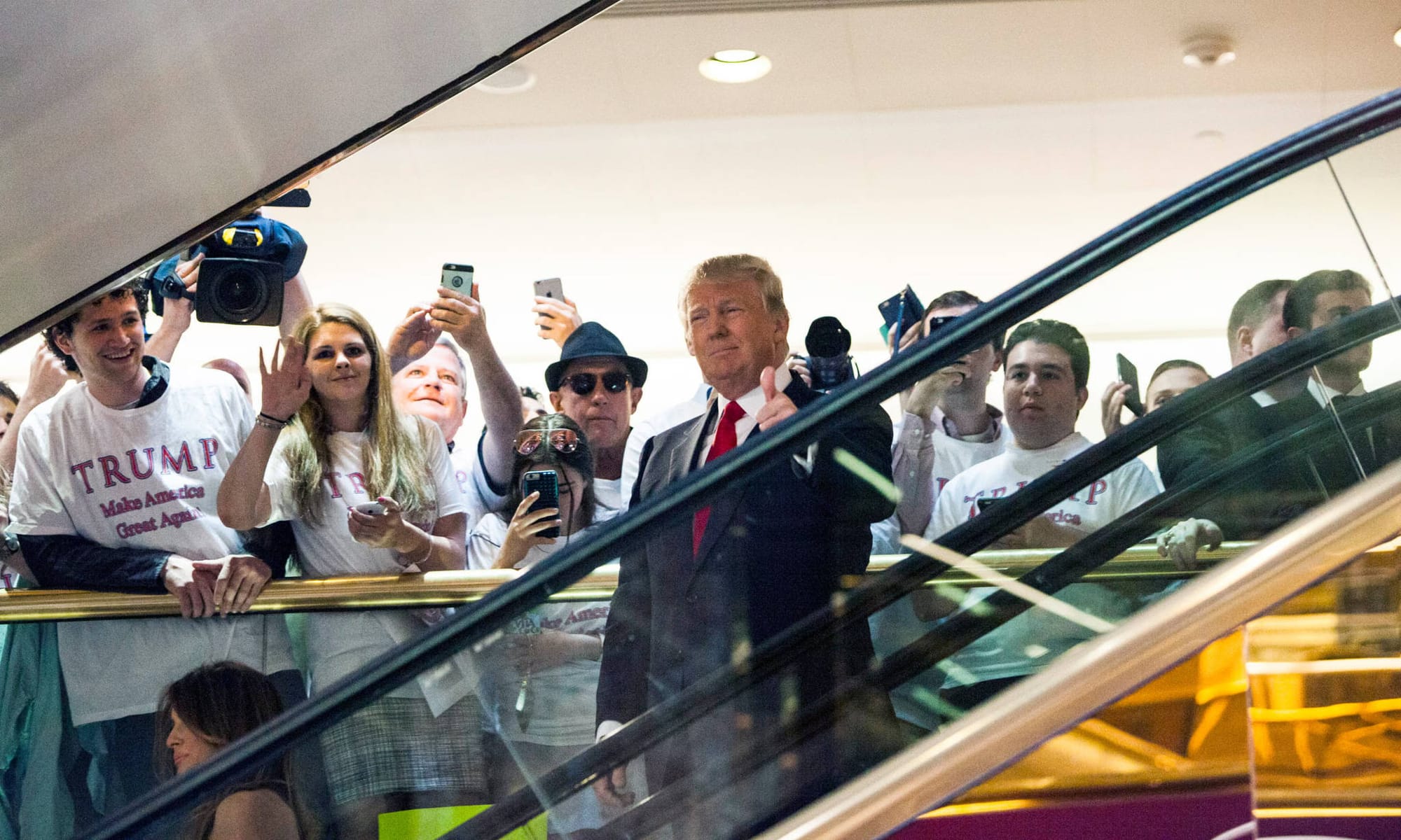 Donald Trump riding down his golden escalator moments before he announces his Republican candidacy
