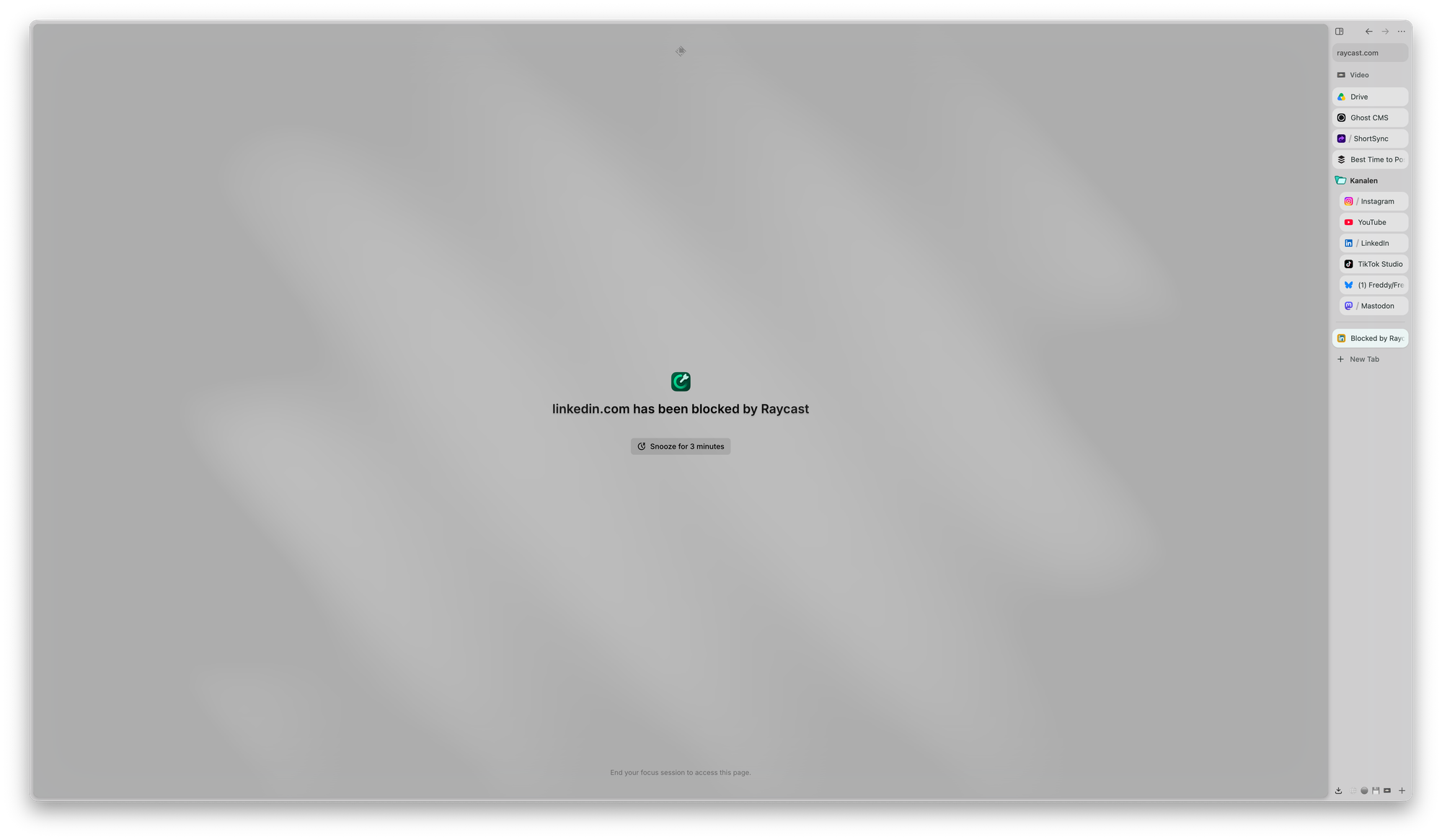 A browser window saying'LinkedIn.com has been blocked by Raycast.'