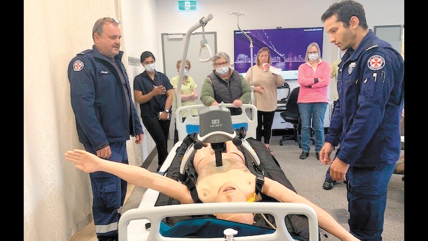 Ambulance officers demo CPR machine