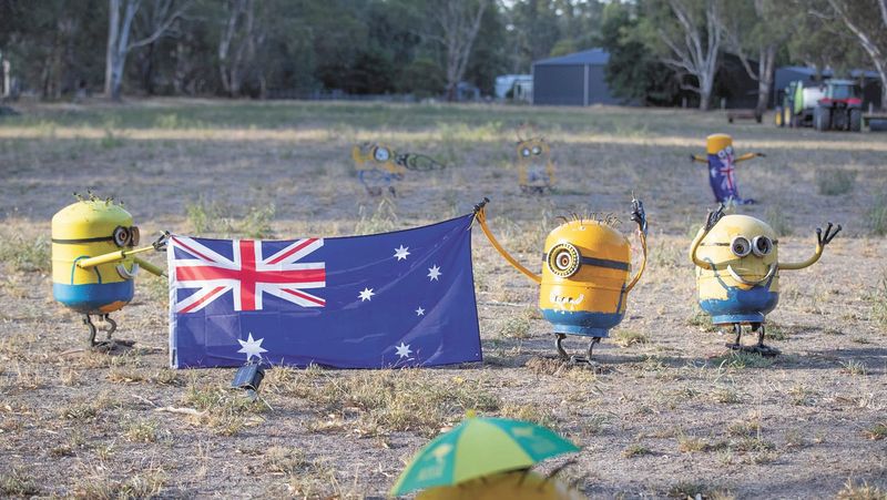 Scrap-metal Minions stop traffic post image