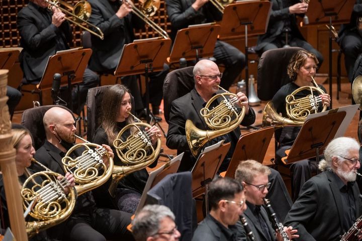 The horns section of SF Symphony plays in a dress rehearsal.