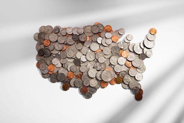 shape of united states of america made out of us coins