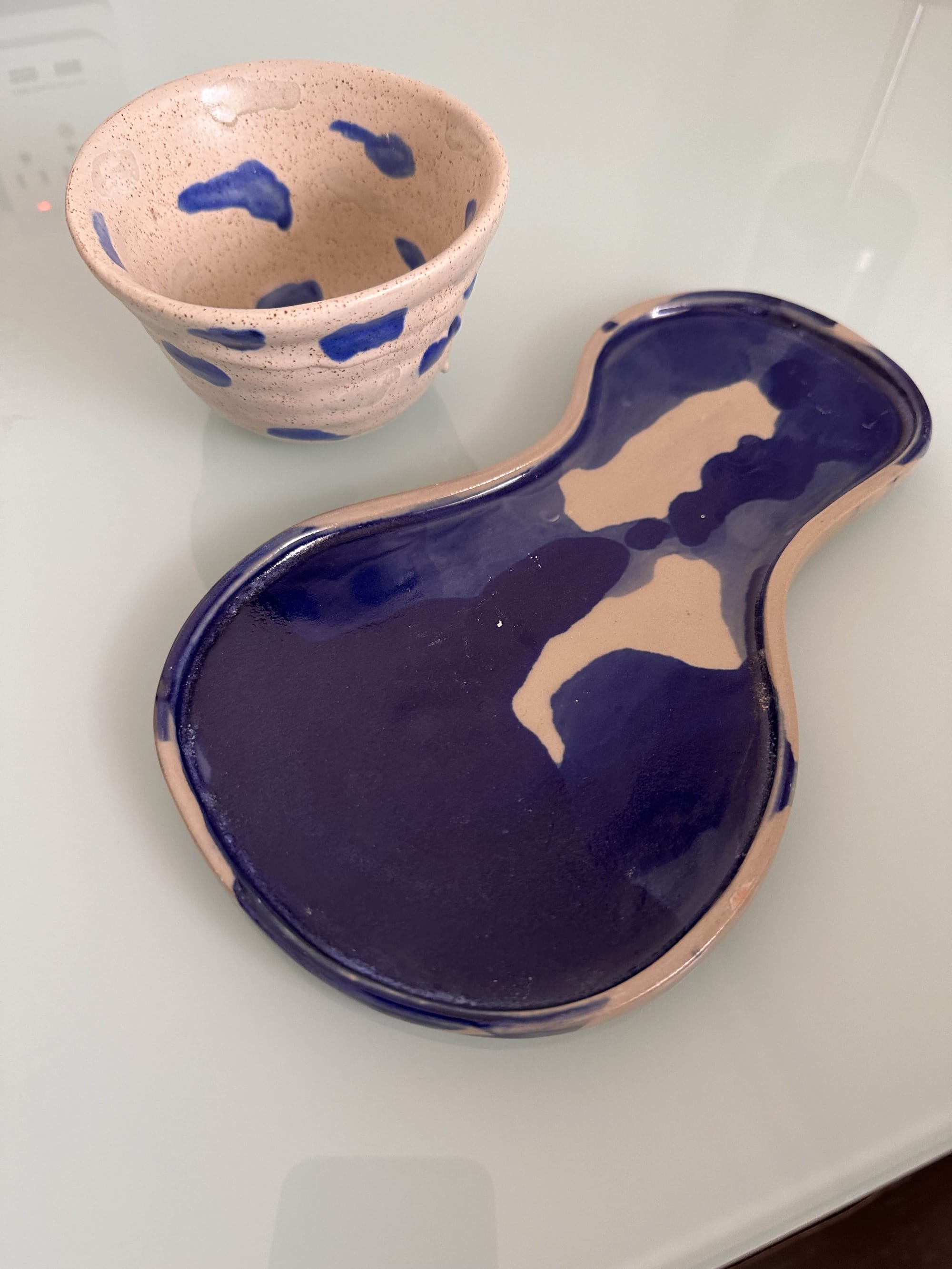 Handmade Ecuadorian pottery - speckled cup and gourd-shaped dish with cobalt blue and cream glazes