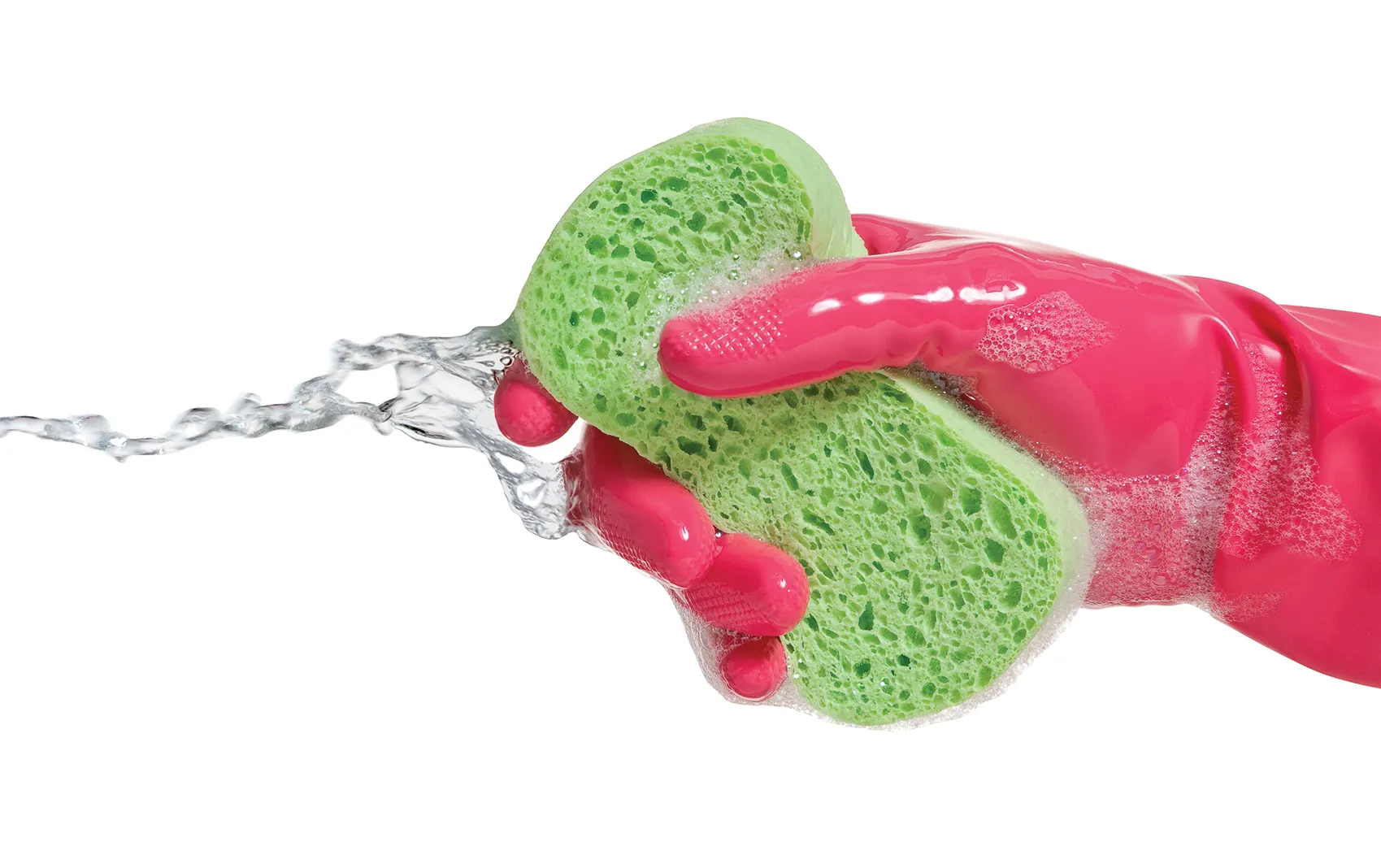 Pink cleaning glove holding soapy green sponge