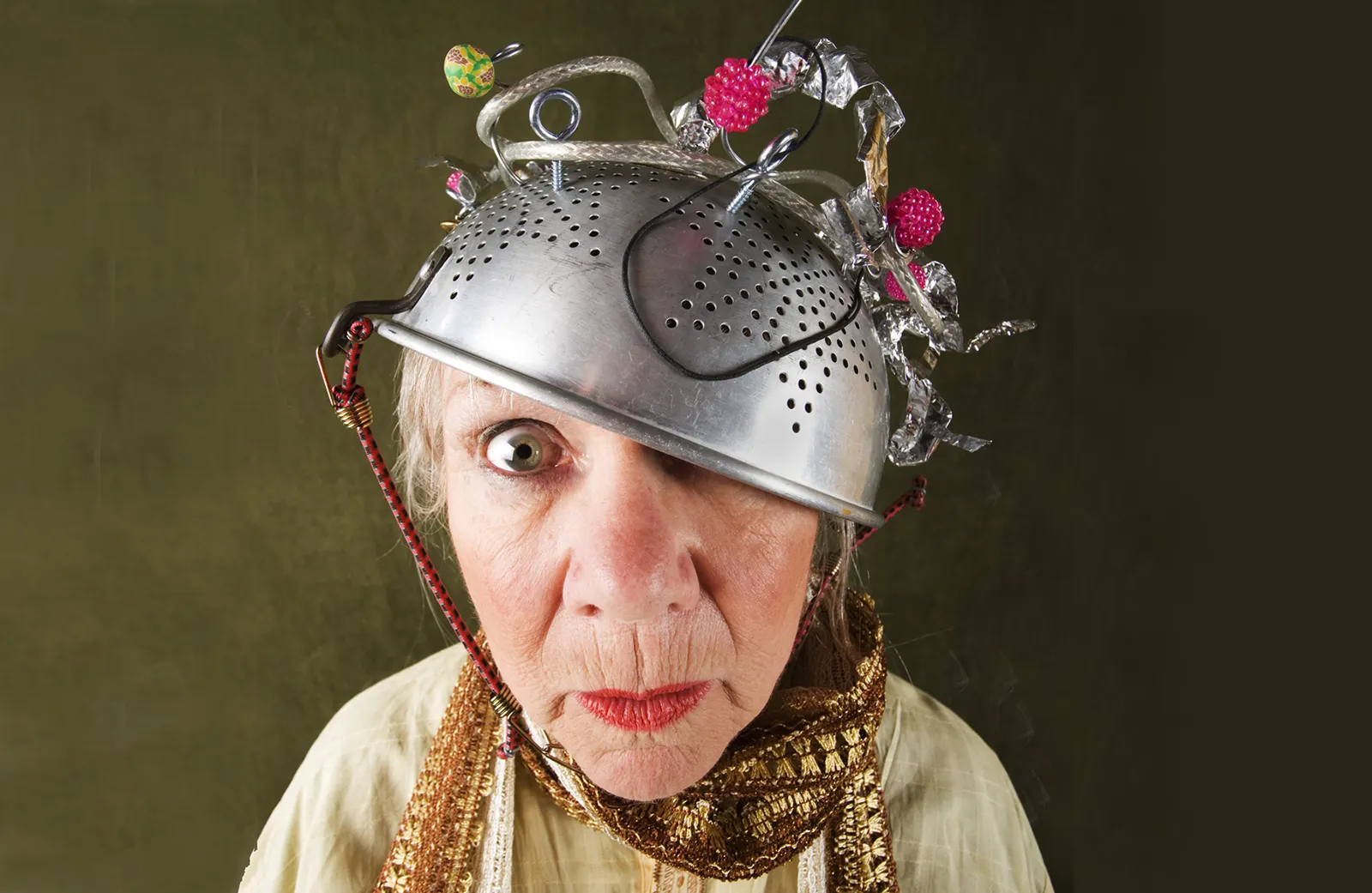 Deranged lady with colander and wires for hat 