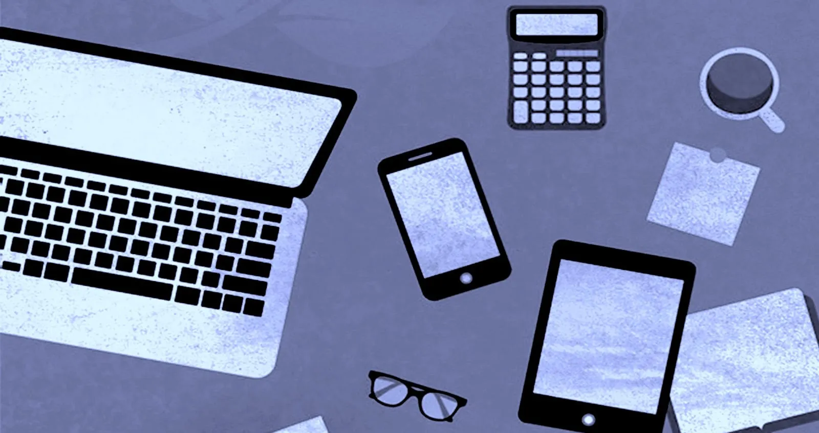 Laptop and other devices on gray-blue background