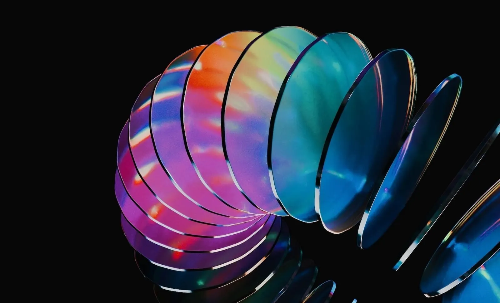 Colorful glass lenses in a slinky curve