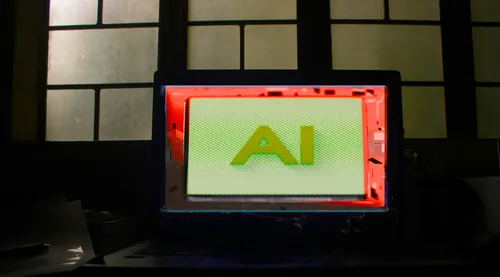 Green AI letters on desktop computer display