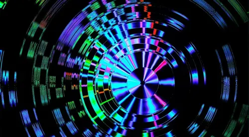 Green and purple spinning disks