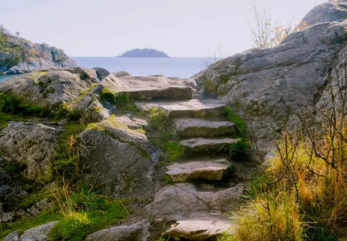 Stone steps leading to view of water