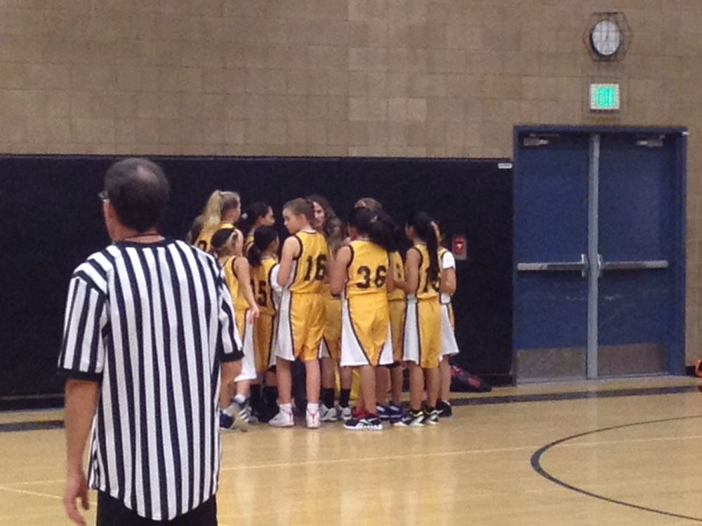 Ella's first US basketball game, lost by 2 goals in overtime