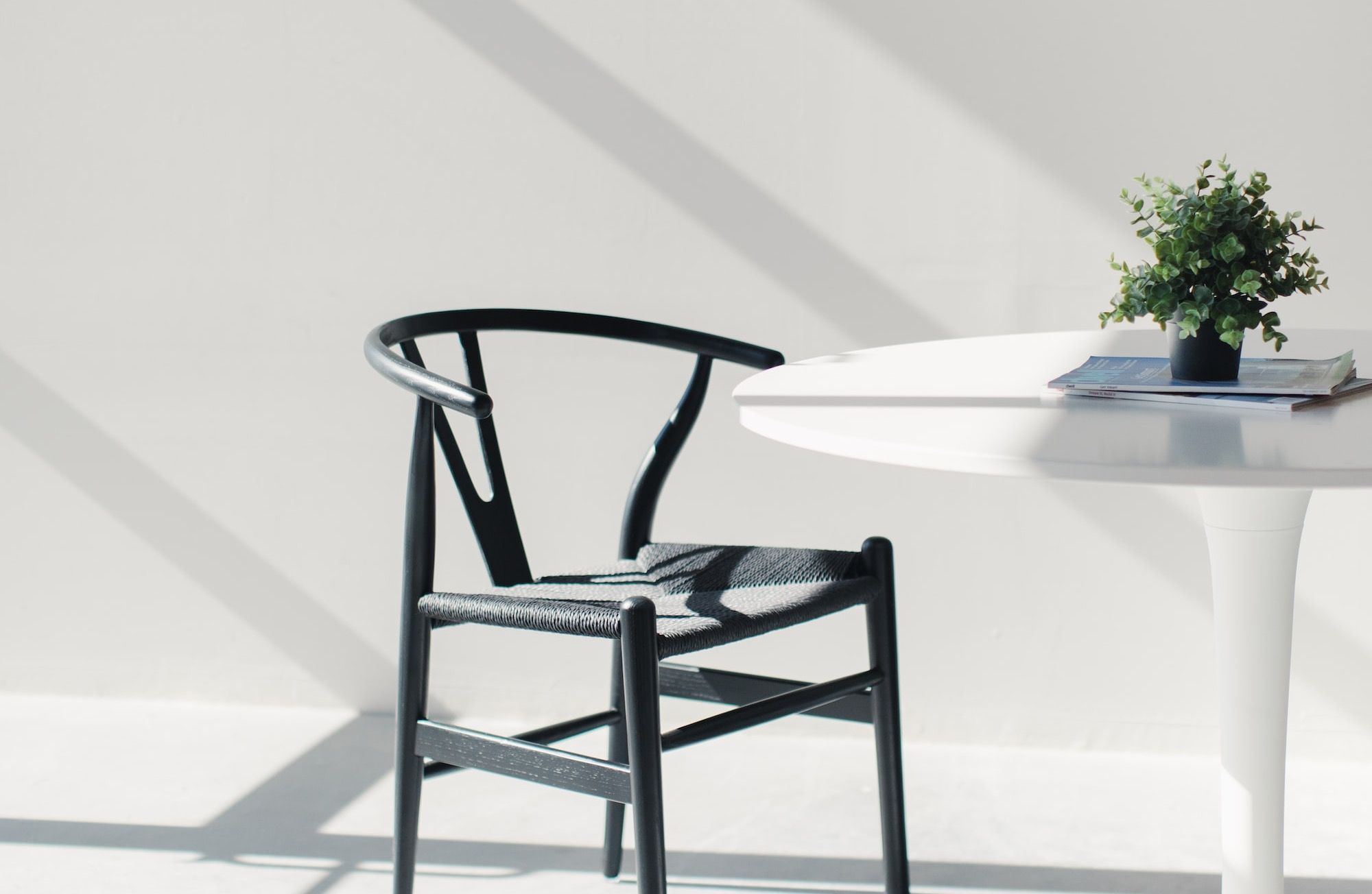 white wooden table with chairs