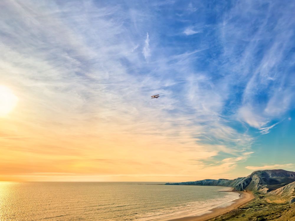 Biplane exploring the morning sky post image