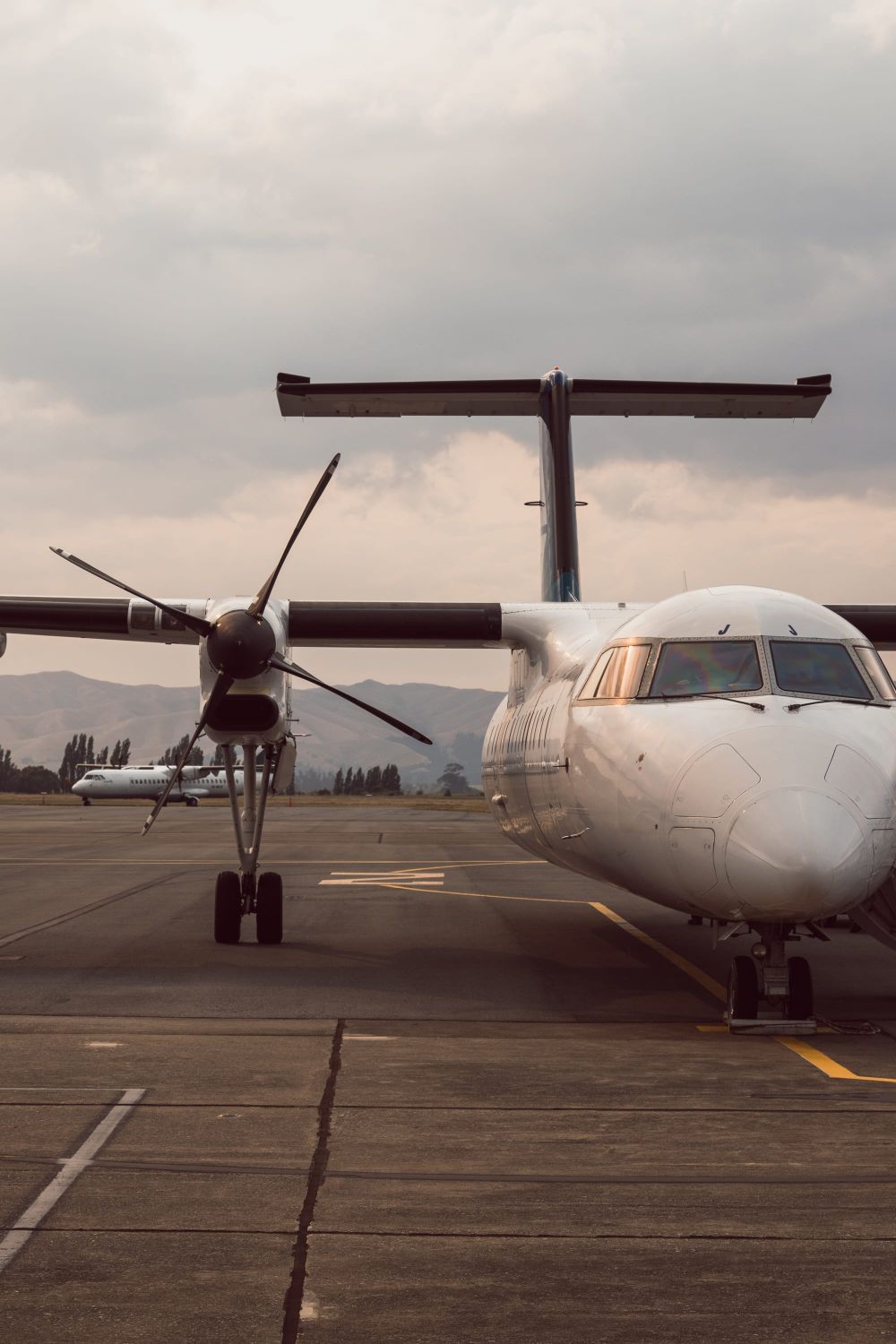 Aircraft parked on runway post image