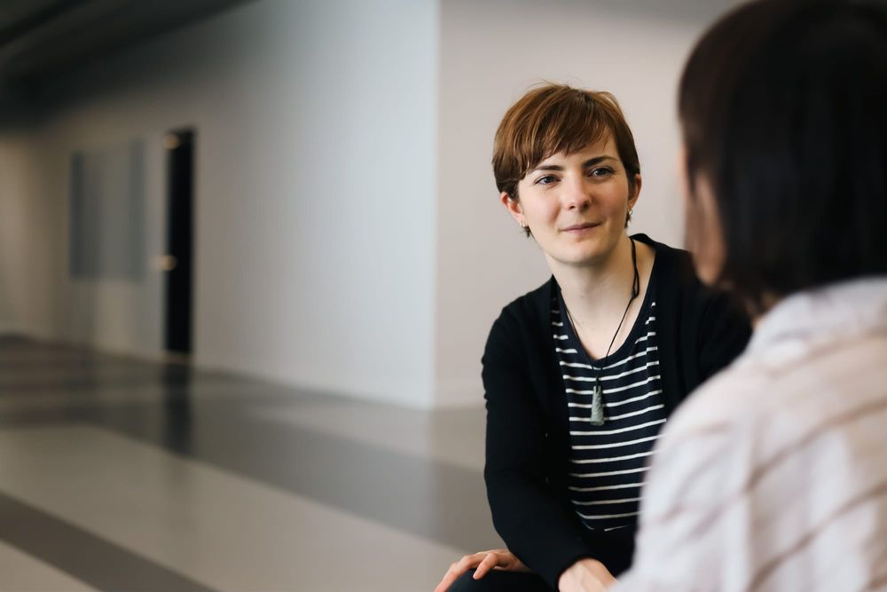 Woman listening attentively during conversation post image