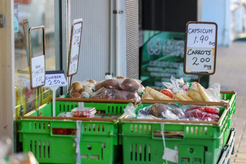 Vegetable market stall with prices post image
