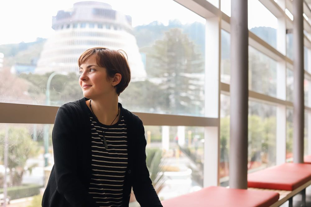 Woman by the window post image