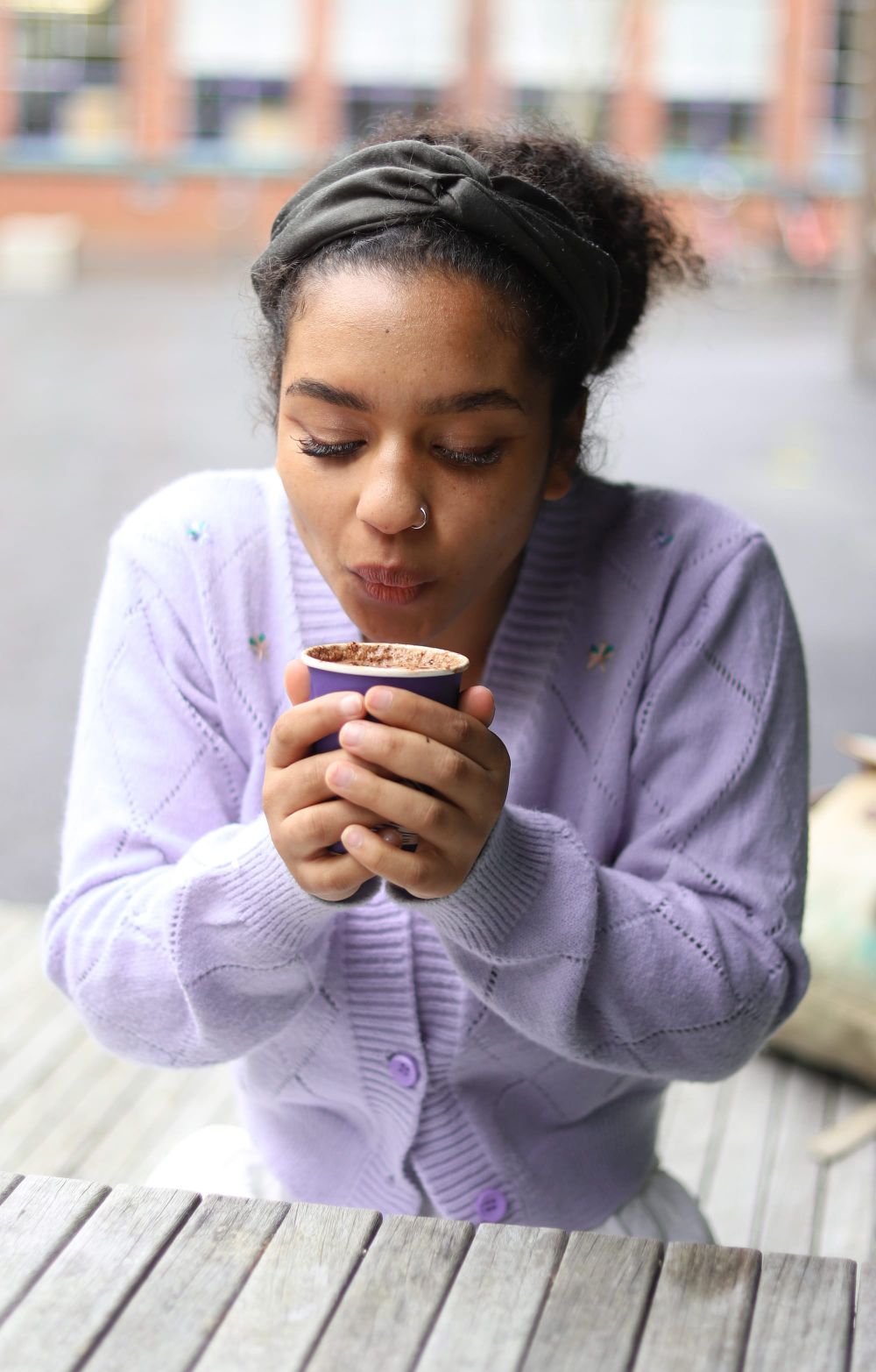 Woman drinking coffee post image