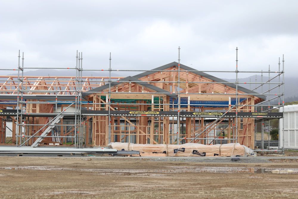 Wooden framing of new house post image