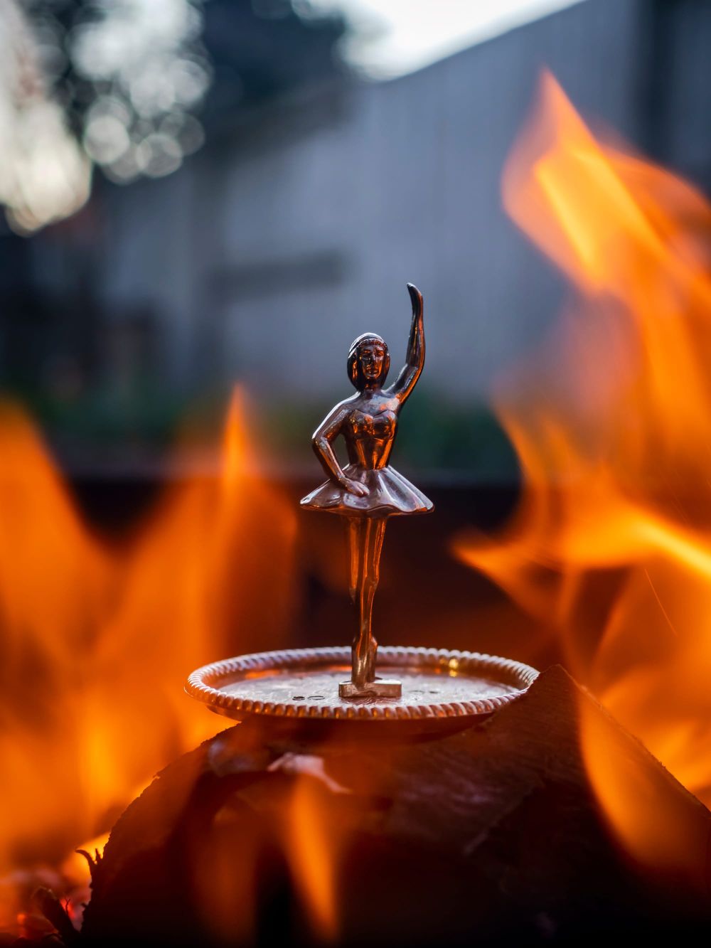 Ballerina figurine flames post image