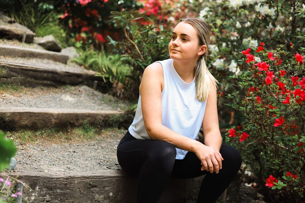 Girl sits on a stone step post image
