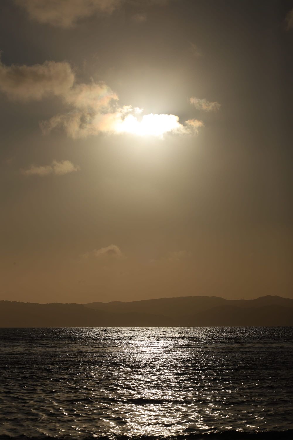 Seascape glow and cloud veil post image