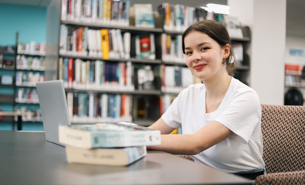 Studying in the library post image