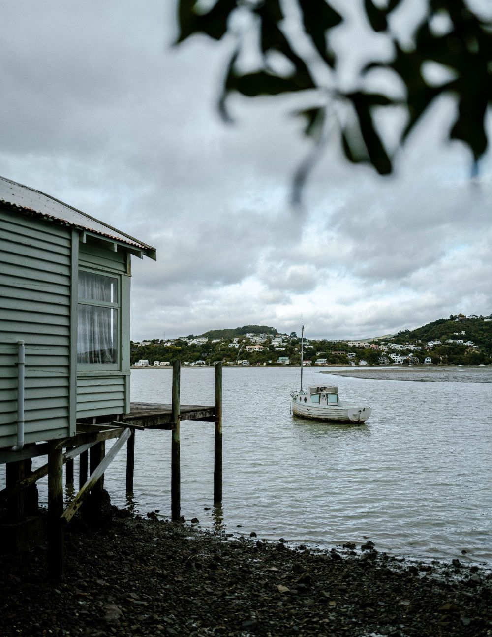 Coastal cabin and boat post image