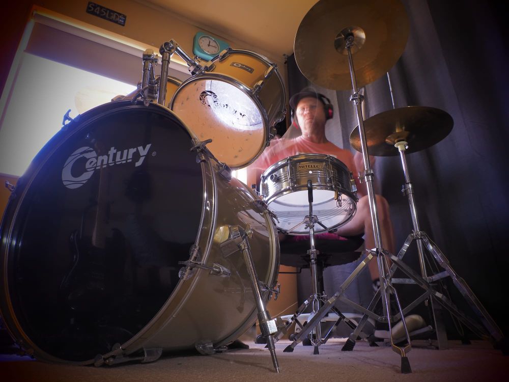Man playing drums post image