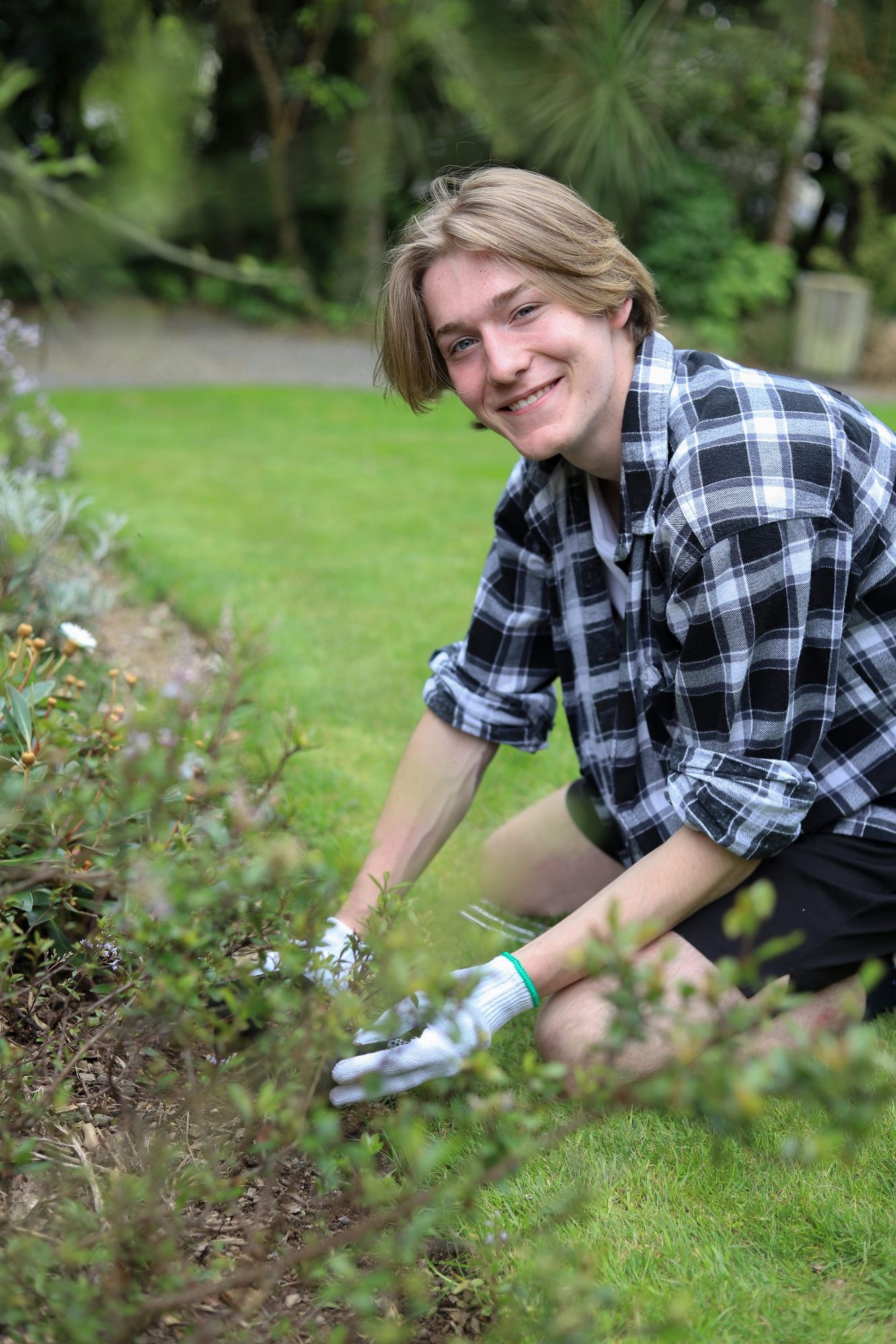 Gardener at work in the backyard