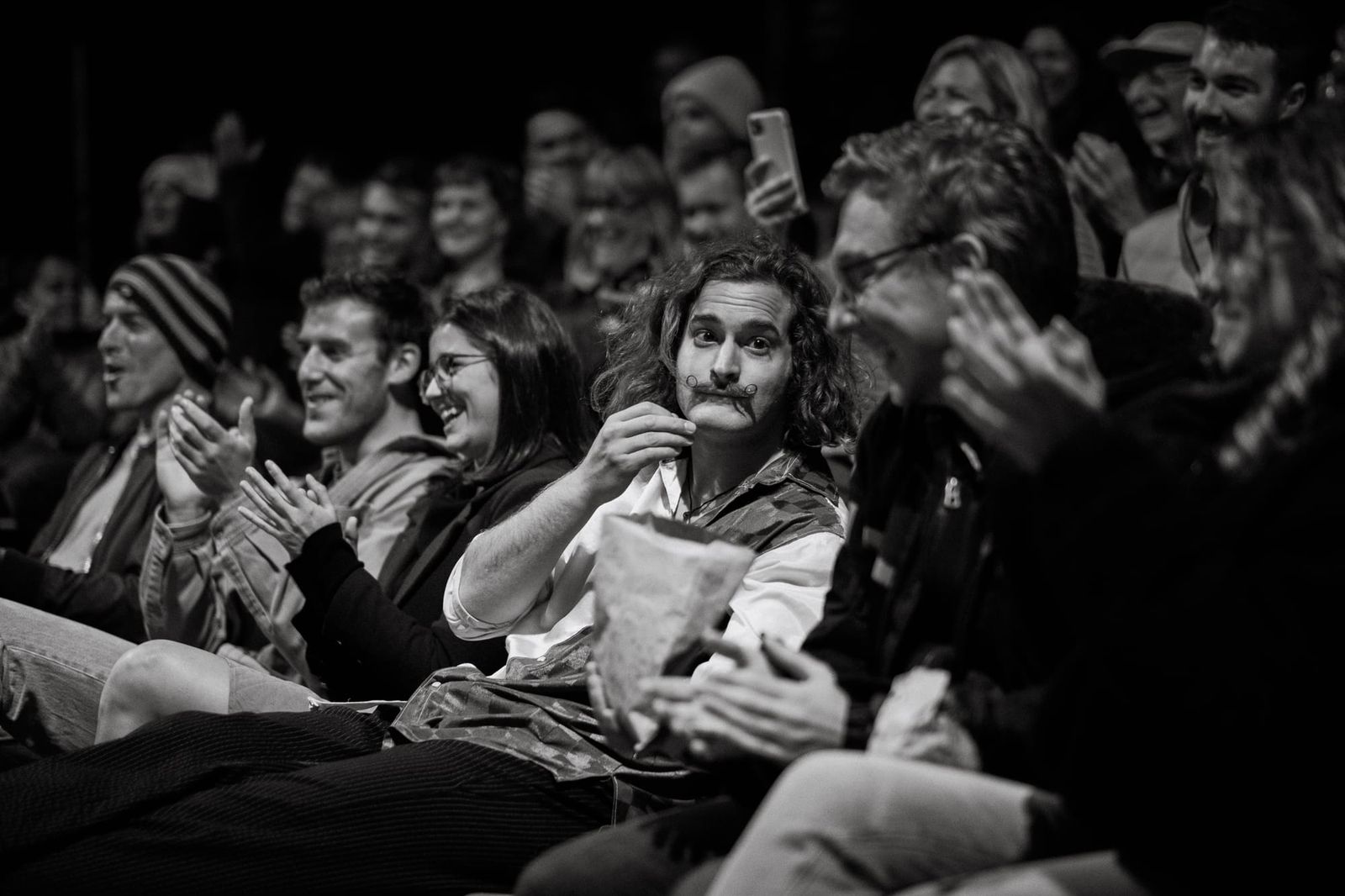 Group enjoying circus performance