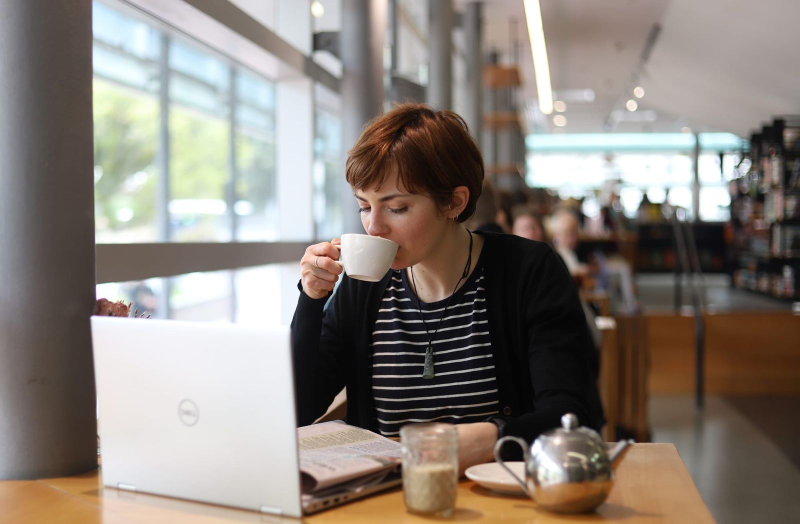 Woman drinking tea in cafe