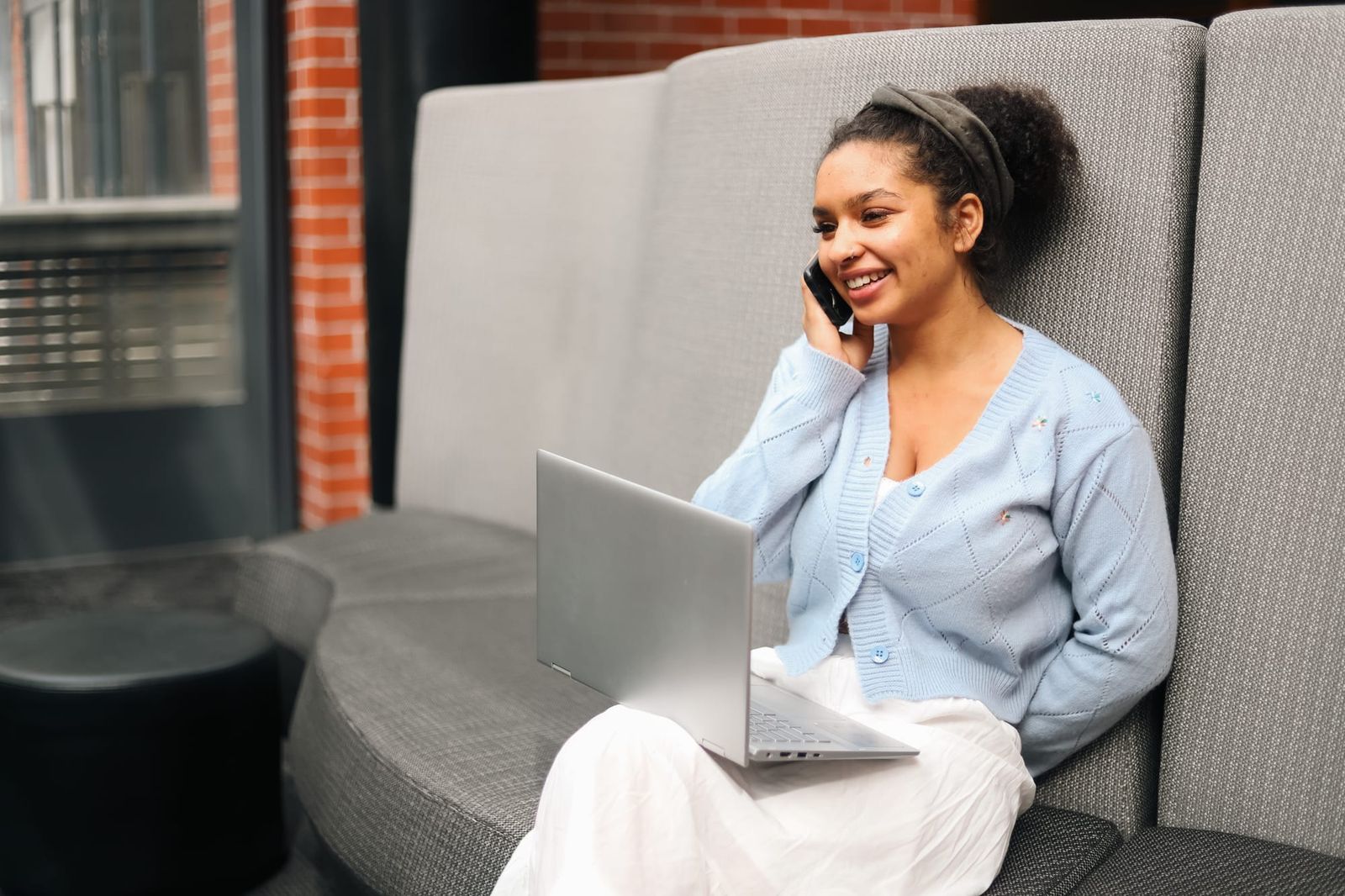 Woman smiling while on phone call