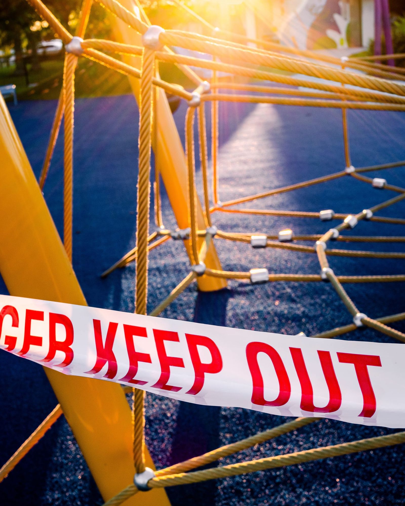 Covid lockdown warning tape playground
