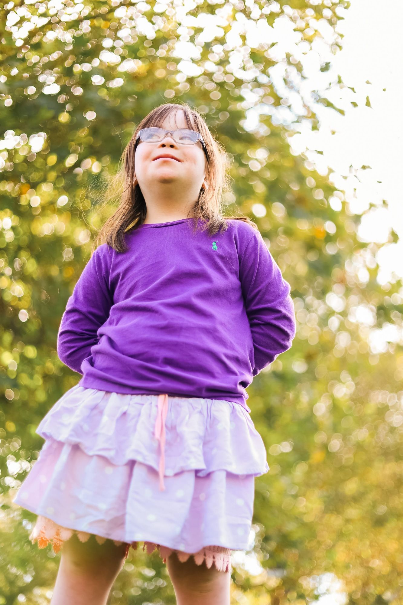 Girl in a purple long-sleeve shirt