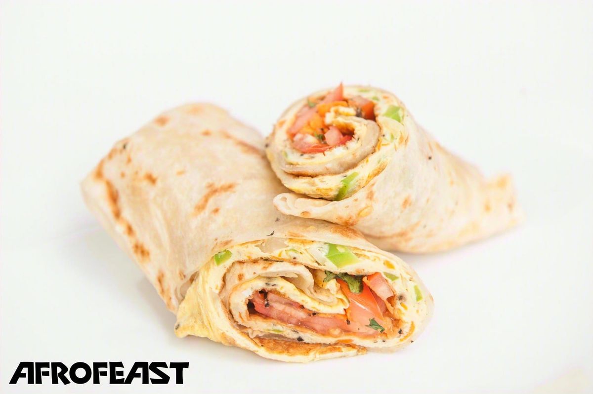 A Ugandan Rolex — egg and veg rolled in chapati — Afrofeast