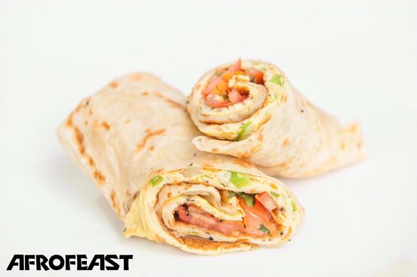 A Ugandan Rolex — egg and veg rolled in chapati — Afrofeast