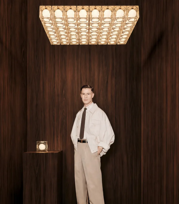 Lee Broom Channels 1970s Glamour With a Smoked Glass Chant Installation