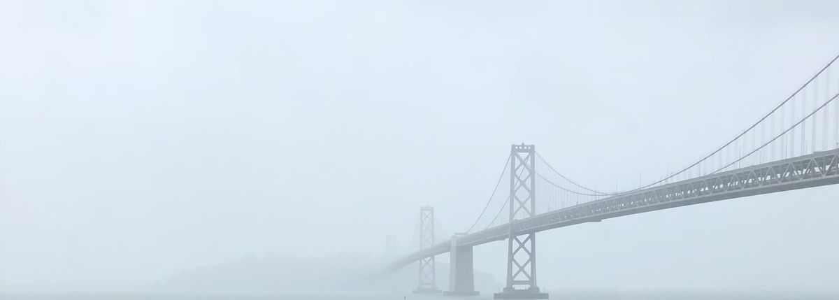 Bridge covered in fog