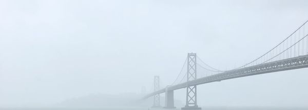 Bridge covered in fog