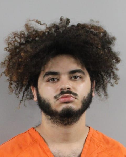 Booking photo for Alexander Santos-Cuervas