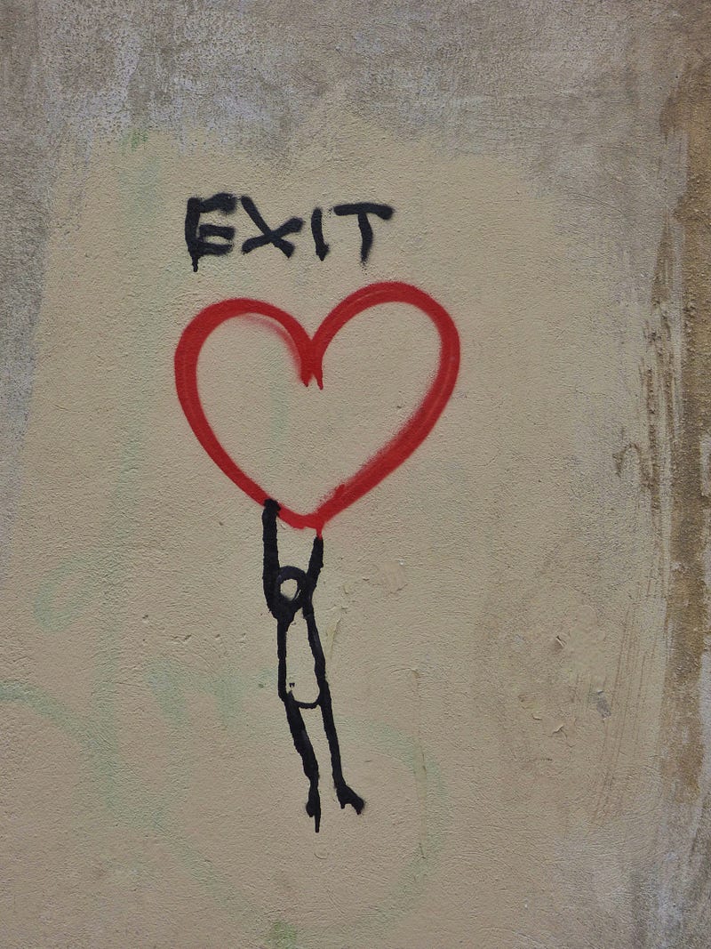 A person is thinking about leaving an unhealthy relationship, indicated by a stick figure hanging from the bottom of a heart with “exit” printed above.