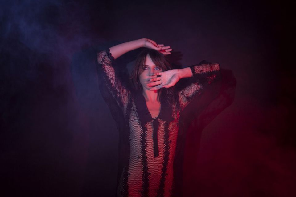 Katie Burden poses in her aura